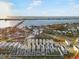 Gorgeous aerial view of waterfront homes near the bay and a scenic bridge at 12413 Gulf Breeze Ter, Cortez, FL 34215