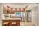 This spacious kitchen features granite countertops, stainless steel appliances, and ample cabinet space at 1610 Treehouse Cir # T130, Sarasota, FL 34231