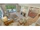 Bright and airy living area with stylish furnishings and view to the patio at 1610 Treehouse Cir # T130, Sarasota, FL 34231