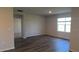 Neutral living room features modern flooring and plenty of outlets at 17060 James Trl, Parrish, FL 34219