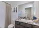 Well-lit bathroom with modern fixtures and a shower-tub combo at 17122 James Trl, Parrish, FL 34219