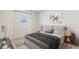 Comfortable bedroom with soft carpet, filled with natural light at 17122 James Trl, Parrish, FL 34219