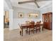 Bright and airy dining room adjacent to the kitchen featuring seating for six at 17604 Hickok Belt Loop, Bradenton, FL 34211
