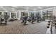 Well-equipped gym featuring modern exercise equipment and large windows providing natural light at 17604 Hickok Belt Loop, Bradenton, FL 34211