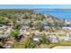 Aerial view showing location of the property near water and landscaping of community at 203 22Nd Ne St, Bradenton, FL 34208