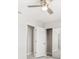 Bright bedroom with a ceiling fan, and mirrored closet doors at 203 22Nd Ne St, Bradenton, FL 34208