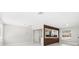 Open concept kitchen with a breakfast bar, stylish range hood, and modern finishes at 203 22Nd Ne St, Bradenton, FL 34208