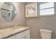 Charming bathroom with granite countertop and vanity at 2332 Canalbluff Pl # 298, Sarasota, FL 34231