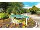 Sign welcoming you to Strathmore Riverside Villas, a vibrant 55+ community at 2332 Canalbluff Pl # 298, Sarasota, FL 34231