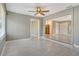 Living room view with access to the kitchen, laundry, and the yard at 2332 Canalbluff Pl # 298, Sarasota, FL 34231