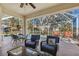 Enjoy outdoor living on this screened-in lanai with views of pool and surrounding landscaping at 2439 Sonoma W Dr, Nokomis, FL 34275