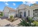 Charming single-story home with a brick walkway leading to a blue front door at 259 Golden Harbour Trl, Bradenton, FL 34212