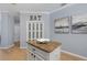Close-up of kitchen island with granite countertop and modern decor at 259 Golden Harbour Trl, Bradenton, FL 34212