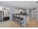 Kitchen with stainless steel appliances, island, and adjacent breakfast bar at 259 Golden Harbour Trl, Bradenton, FL 34212