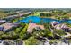 Desirable neighborhood, featuring a tile roof home near the water and a golf course at 3153 Founders Club Dr, Sarasota, FL 34240