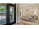 Elegant dining room featuring a chandelier and a garden view at 3153 Founders Club Dr, Sarasota, FL 34240