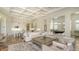 Expansive open-concept living area featuring a gourmet kitchen, cozy lounge, and games area at 3153 Founders Club Dr, Sarasota, FL 34240