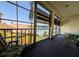Inviting balcony with community views, furnished with comfortable seating perfect for enjoying the outdoors at 3719 Lake Bayshore Dr # H-204, Bradenton, FL 34205