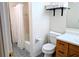 Clean bathroom featuring a shower/tub combo, toilet, sink with vanity, and tiled floor at 3719 Lake Bayshore Dr # H-204, Bradenton, FL 34205