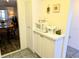 This charming kitchen boasts extra counter space, white cabinets, and storage for organizing everyday items at 3719 Lake Bayshore Dr # H-204, Bradenton, FL 34205