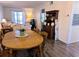 Inviting living room seamlessly transitions into the dining area, creating a comfortable and connected living space at 3719 Lake Bayshore Dr # H-204, Bradenton, FL 34205