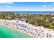 Aerial view of the property's location near the beach with lifeguard stands at 4002 6Th Ave, Holmes Beach, FL 34217