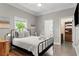 Bedroom with beach-themed decor, closet, and natural light at 4002 6Th Ave, Holmes Beach, FL 34217
