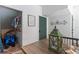 Cozy patio area with a lantern and beachy decor near a storage space, perfect for beachside living at 4002 6Th Ave, Holmes Beach, FL 34217