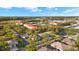 Overhead view displaying the property's location within the community, showcasing landscaping and neighborhood surroundings at 411 28Th W St, Palmetto, FL 34221