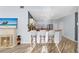 The open-concept kitchen includes a breakfast bar and stainless-steel appliances, seamlessly connecting to the living area at 411 28Th W St, Palmetto, FL 34221