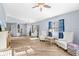 Open living space featuring wood-style floors, stylish furniture, and modern lighting, perfect for relaxation and entertainment at 411 28Th W St, Palmetto, FL 34221