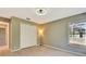 Spacious bedroom featuring light wood floors, neutral paint and a large closet at 4201 74Th E Ter, Sarasota, FL 34243