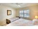 Bedroom with two beds, shutters and ceiling fan at 4307 Gulf Dr # 202, Holmes Beach, FL 34217