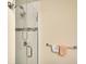 Modern tiled shower with glass enclosure and chrome fixtures at 4307 Gulf Dr # 202, Holmes Beach, FL 34217