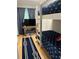 Bedroom with bunk beds, TV, and nautical theme decor at 4705 Hollingsworth Ave, Sarasota, FL 34233