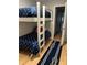 Bedroom with bunk beds and nautical themed decor at 4705 Hollingsworth Ave, Sarasota, FL 34233