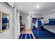 Charming bedroom with a built-in bunk bed, natural light, and stylish décor at 4705 Hollingsworth Ave, Sarasota, FL 34233