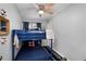 Charming ' bedroom with blue bunk beds and nautical decor at 4705 Hollingsworth Ave, Sarasota, FL 34233