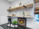 Kitchen details: Open shelving, subway tile, and modern appliances at 4705 Hollingsworth Ave, Sarasota, FL 34233