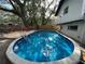 Backyard in-ground pool offers a refreshing oasis for leisure and recreation at 4705 Hollingsworth Ave, Sarasota, FL 34233