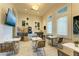 Cozy cafe with modern decor, comfortable seating, and a coffee bar, ideal for casual meetings and relaxation at 5129 Marina Basin Ct, Bradenton, FL 34211
