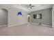 Living room features tile flooring, a ceiling fan, and direct access to other rooms in the house at 5354 Nathaniel Pl, Sarasota, FL 34233
