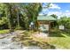 A scenic view of a preserve featuring an informational kiosk and natural surroundings at 5354 Nathaniel Pl, Sarasota, FL 34233