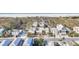 Aerial view showcases beachfront homes near the ocean, emphasizing the community's prime location at 540 Beach Rd # 510, Sarasota, FL 34242