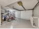 Spacious garage features ample room for storage with bikes, shelving, and a clean, well-lit interior at 540 Beach Rd # 510, Sarasota, FL 34242