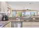Updated kitchen with stainless steel appliances, granite counters, and ocean views at 540 Beach Rd # 510, Sarasota, FL 34242