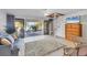 Living room with tiled floors, spiral staircase, and sliding glass doors to the outdoor patio at 540 Beach Rd # 510, Sarasota, FL 34242