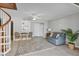 Living room boasts tiled floors, a spiral staircase, and cozy furnishings at 540 Beach Rd # 510, Sarasota, FL 34242