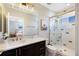 Modern bathroom with a glass-enclosed shower, stylish vanity, and sleek fixtures provides convenience at 541 Fore Dr, Bradenton, FL 34208