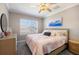 Bright bedroom with large window, ceiling fan, and comfortable bed at 541 Fore Dr, Bradenton, FL 34208
